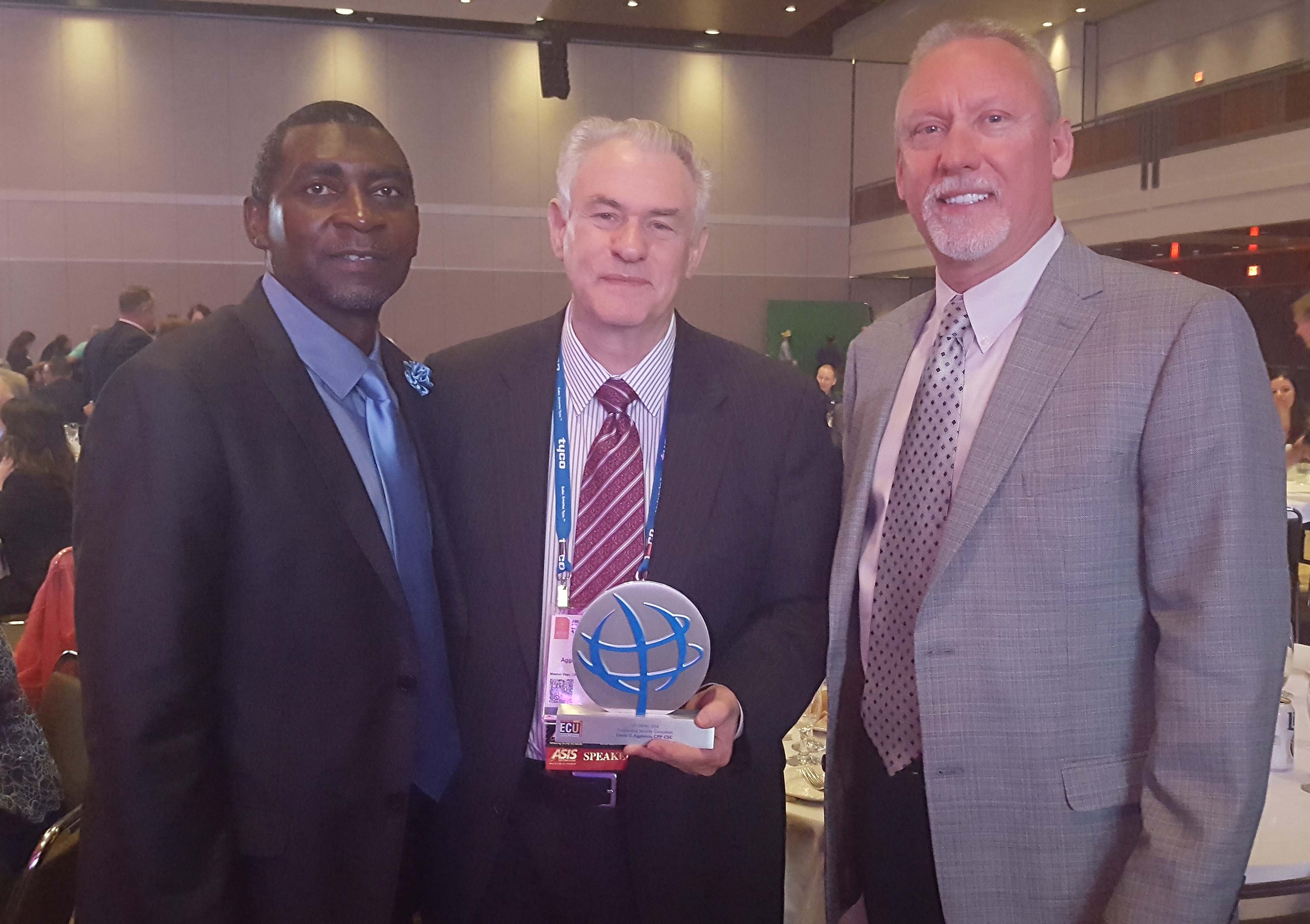 OSPA award winner David Aggleton (center) with IAPSC President Harold Gillens (left) and IAPSC member and OSPA finalist Pete Van Beek at the 2016 U.S. awards ceremony in Orlando.