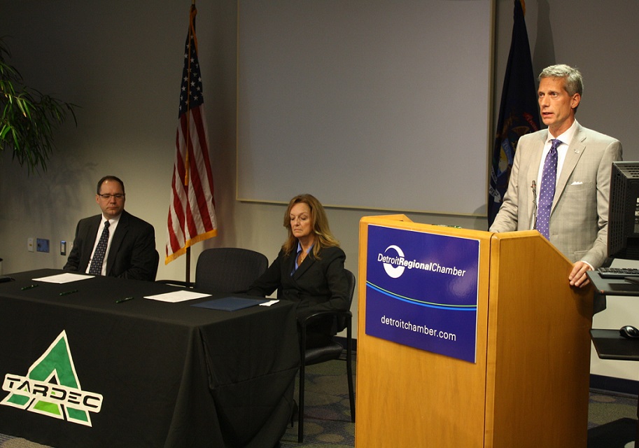 David Schutt, PhD, CEO of SAE International talks during the signing ceremony for the newly established Defense Automotive Technologies Consortium.