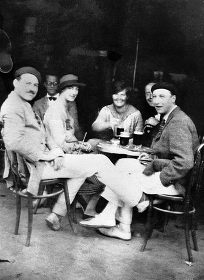 Ernest Hemingway with friends in a café 1925