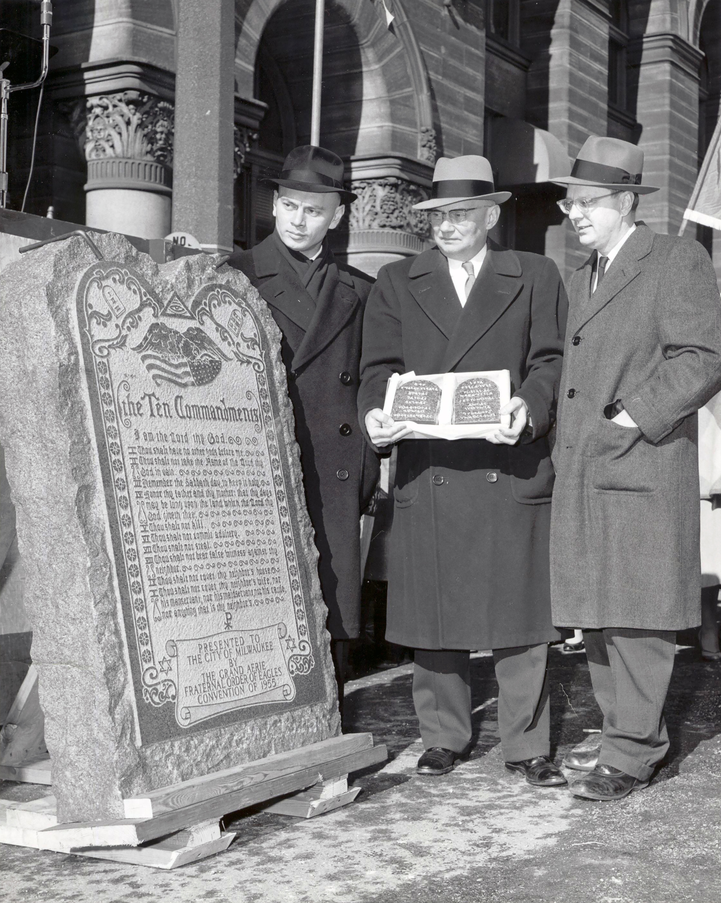 Actor Yul Brenner, star of The Ten Commandments film, with F.O.E.representatives at dedication of F.O.E. Ten Commandents monument in Milwaukee, WI, 1955.