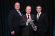 President Porter "Buddy" Ozanne (middle) and Vice President Christopher Sorrow (right) accept Be Greater Award from Rick Folk, Senior Vice President, Regional Managing Director, Fidelity Investments