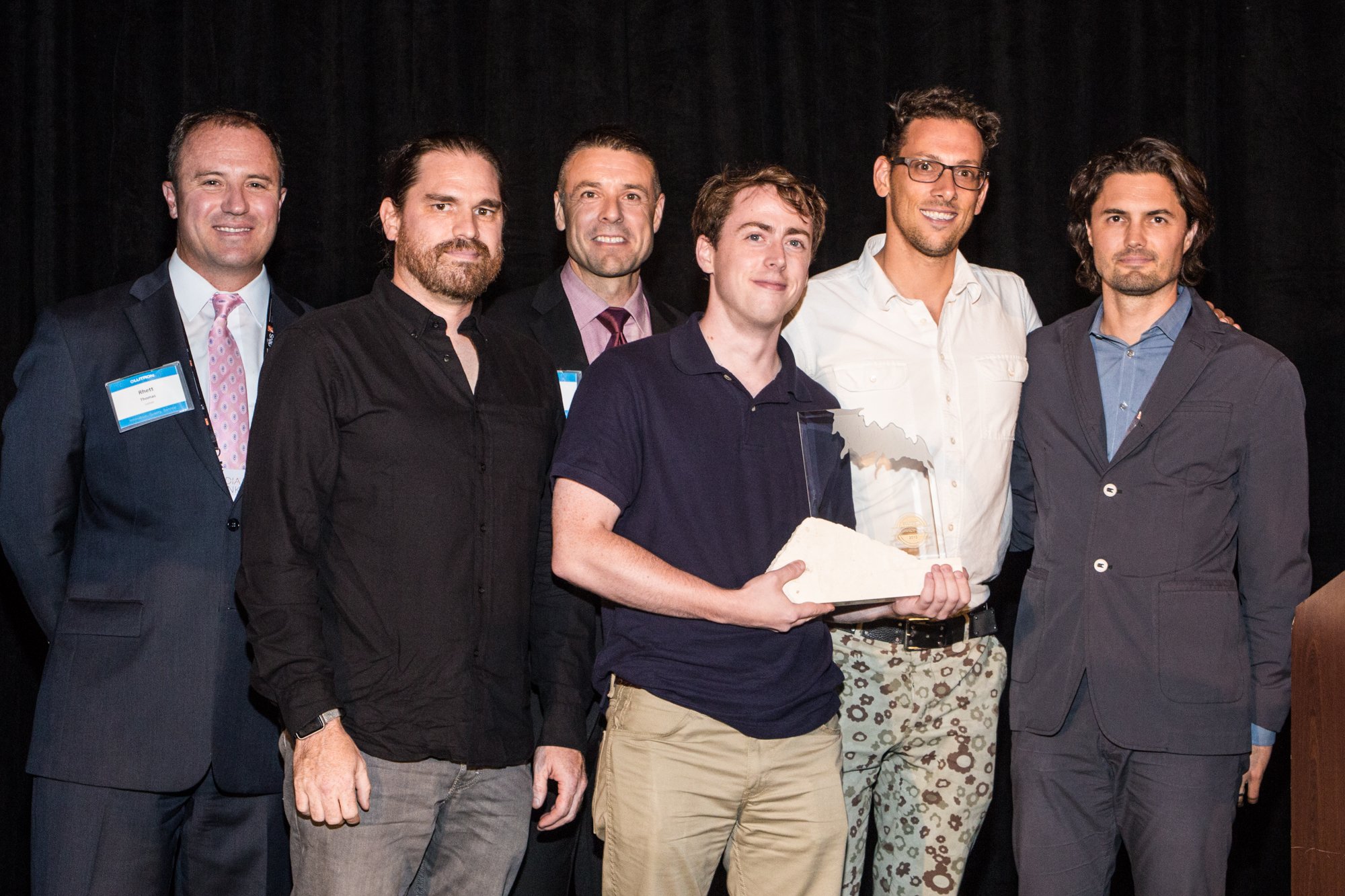 OneButton Accepts Excellence Award