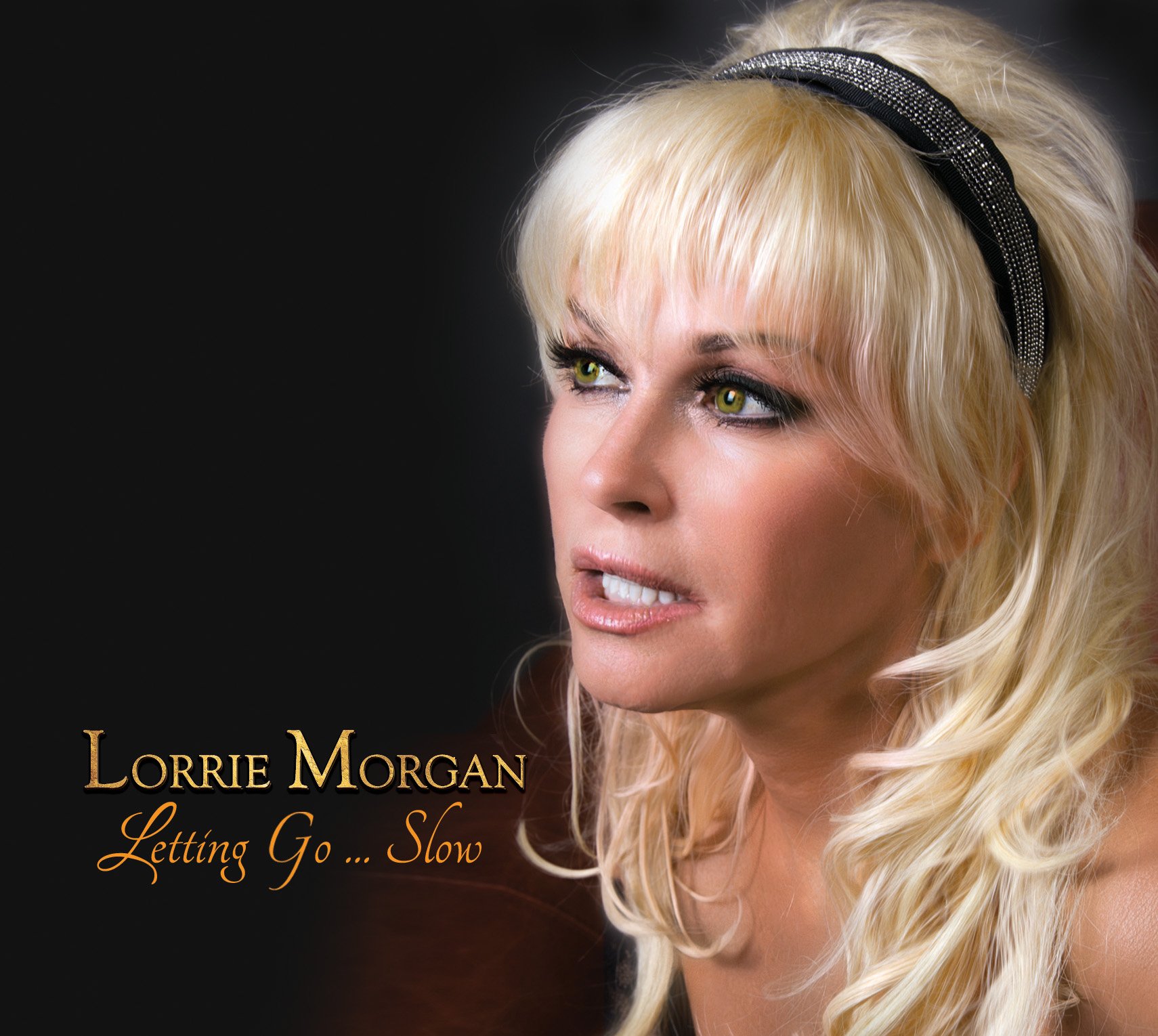 Nominated for 4 Grammy Awards, Lorrie Morgan's latest album is "Letting Go Slow" produced by Richard Landis