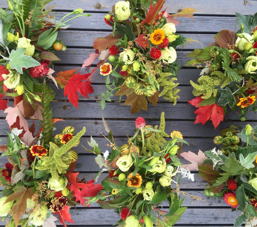Add scarlet leaves and ornamental grains to convey autumn's rich palette. Hannah Morgan of Fortunate Orchard in Seattle, WA, tucked vibrant foliage from local maple, oak and liquidambar trees into sea