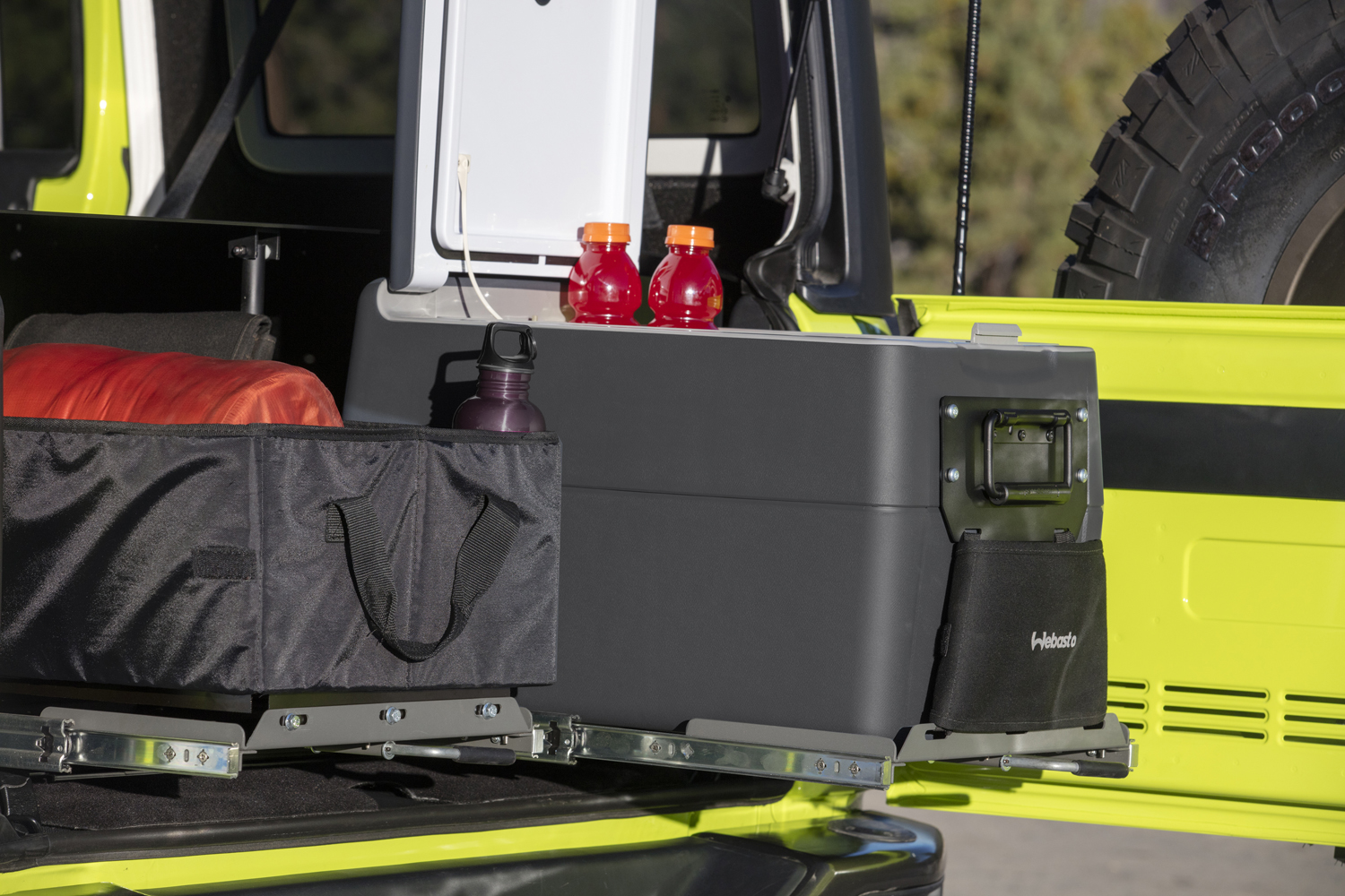 Webasto makes loading and unloading the Jeep Wrangler easy and hassle free with its new Dual Cargo Slides.