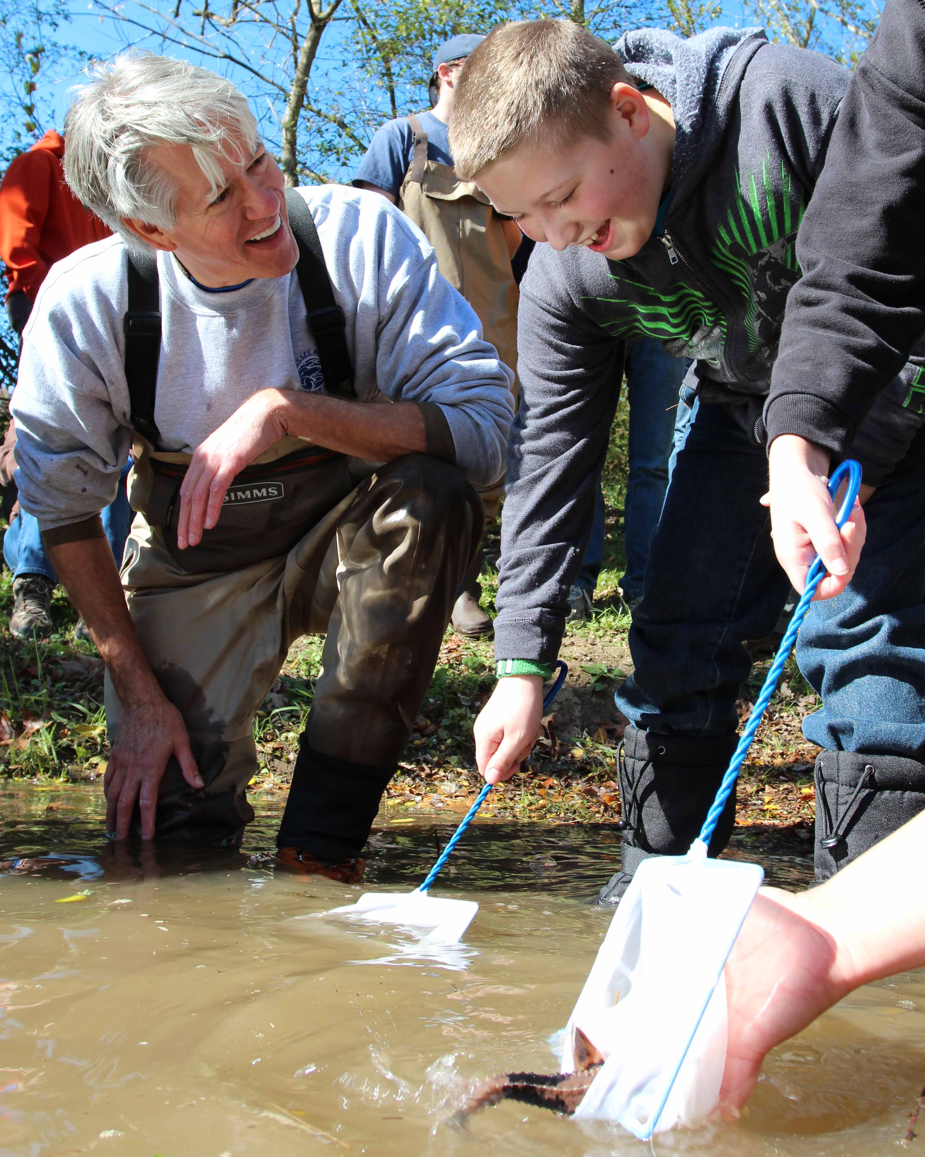 Dr. Bernie Kuhajda releasing Lake Sturgeon with Gap Creek Elementary students credit Thom Benson TN Aquarium