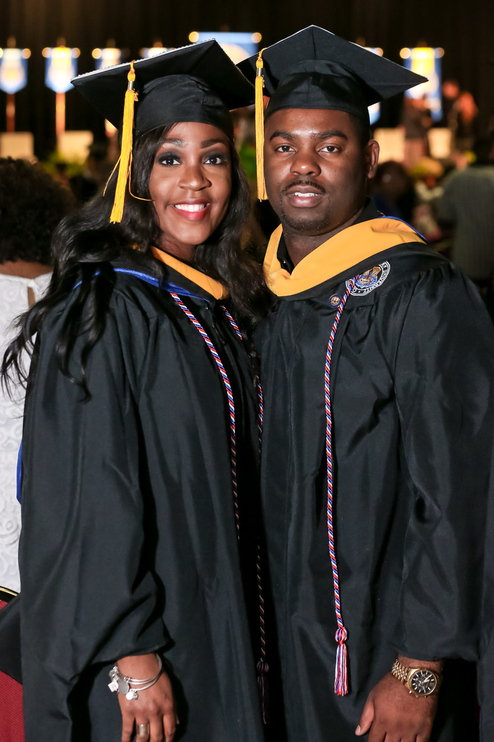 Christian Allen, left, and Gilbert Galloway Jr. graduated together at the Columbia Southern University commencement ceremonies on Oct.28 in Orange Beach, Ala.