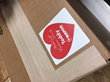 Adding a giving heart to the NAPCO packaging