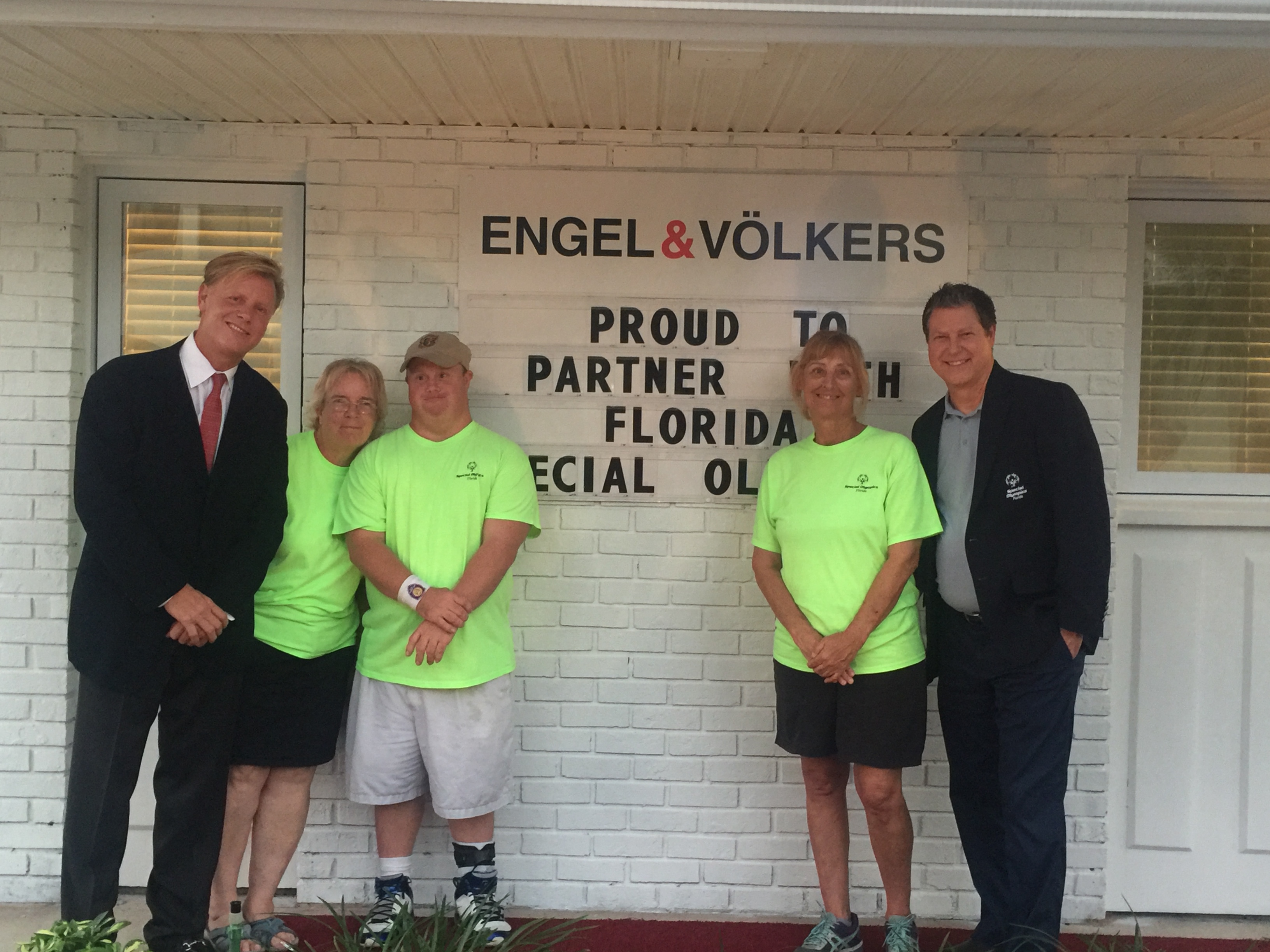 License Partner Garat Oates, Special Olympic Athlete Steven and his mother. Deb Spence, Special Olympics Brevard County, Larry Daniell Chief Development and Marketing Officer, Special Olympics Florida