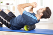 The Tummy Trimmer is a roller device made of plastic and metal that can be  moved up and down in a wave motion to exercise the upper body and create firm abs.
