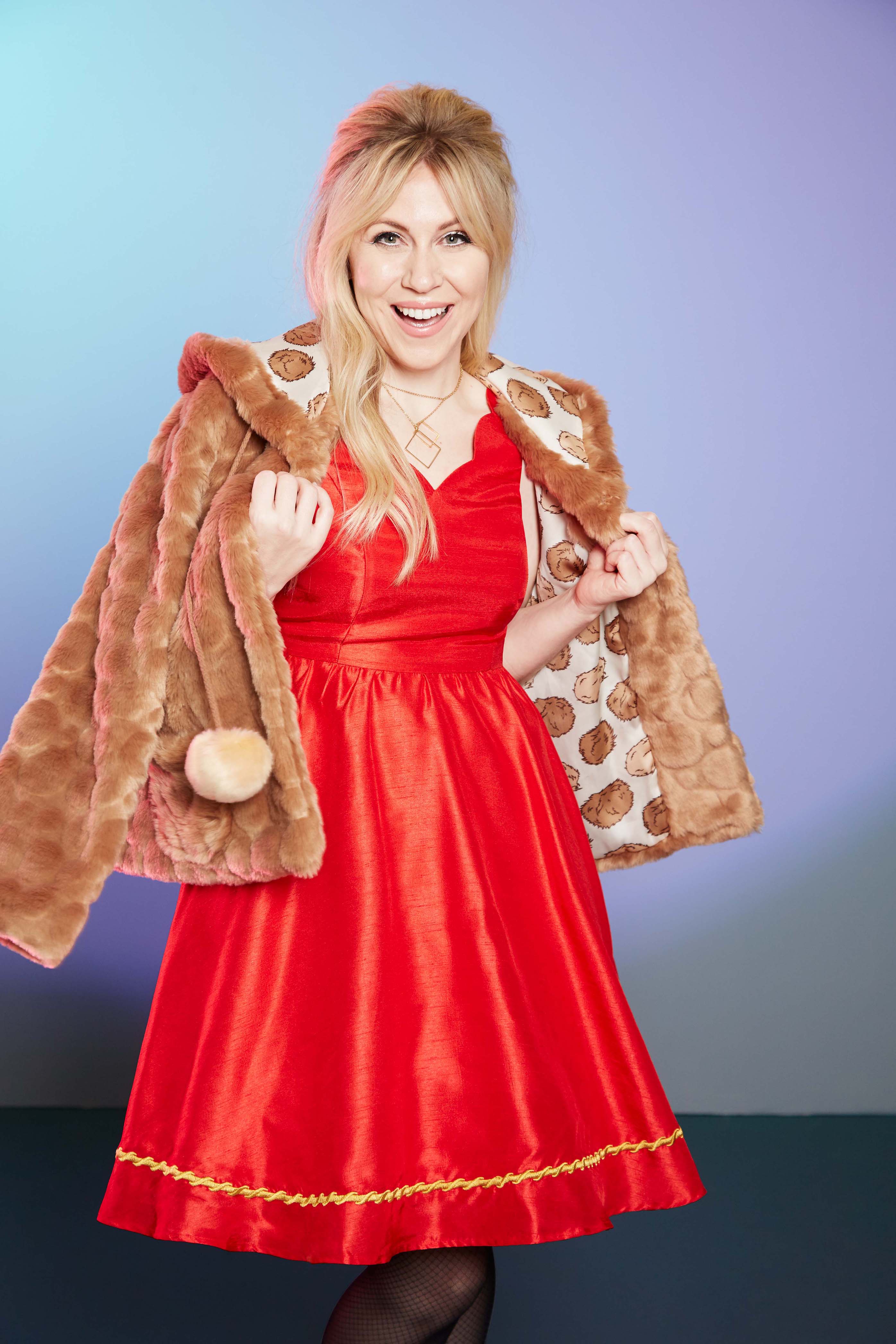 Part of the ThinkGeek Star Trek Collection by Her Universe is this stunning Star Trek Bardot Party Dress and Star Trek Tribble Faux Fur Coat.