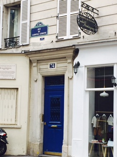 A blue door marks Hemingway’s former apartment at 74 Rue du Cardinal-Lemoine, one of many sights on Left Bank Writers Retreat’s daily literary tours.