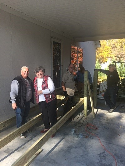 Ann Measmer, Comfort Keepers, with volunteers from NC Baptist Aging Ministries, beginning ramp construction