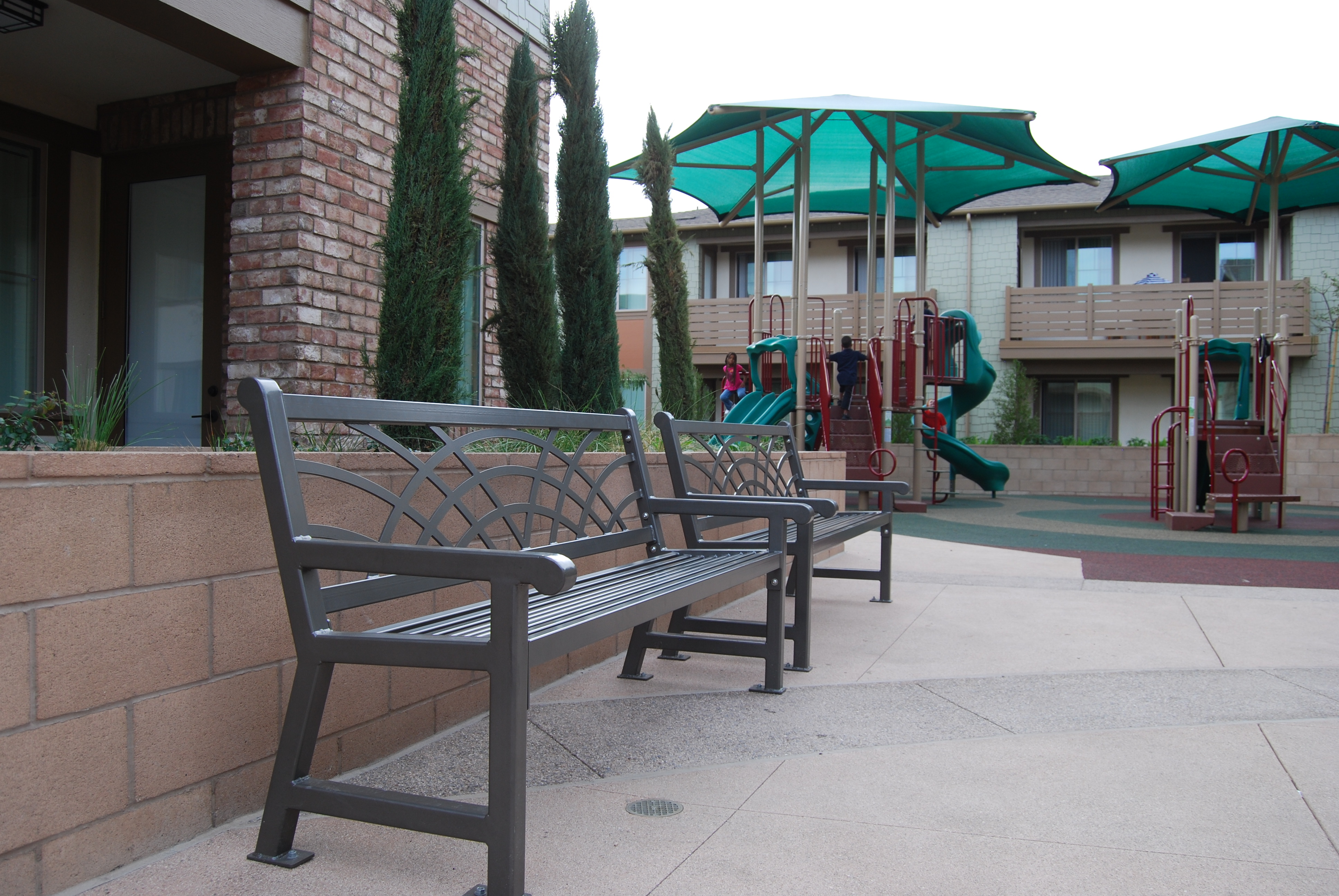 Comfortable site amenities allow parents to observe their children at play