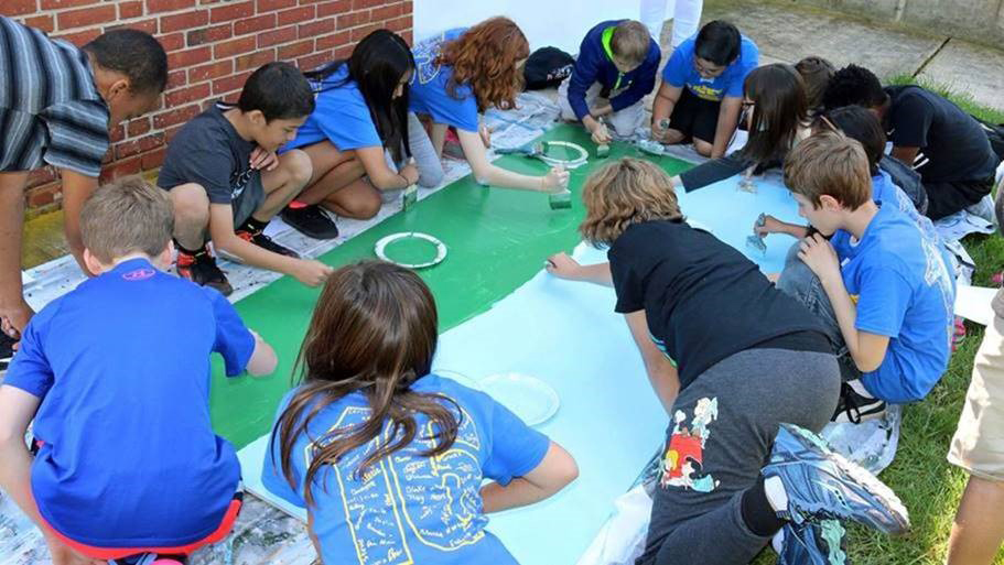 Students in the Anne Arundel County school district show off their creativity, supervised by Mangan Kassal.