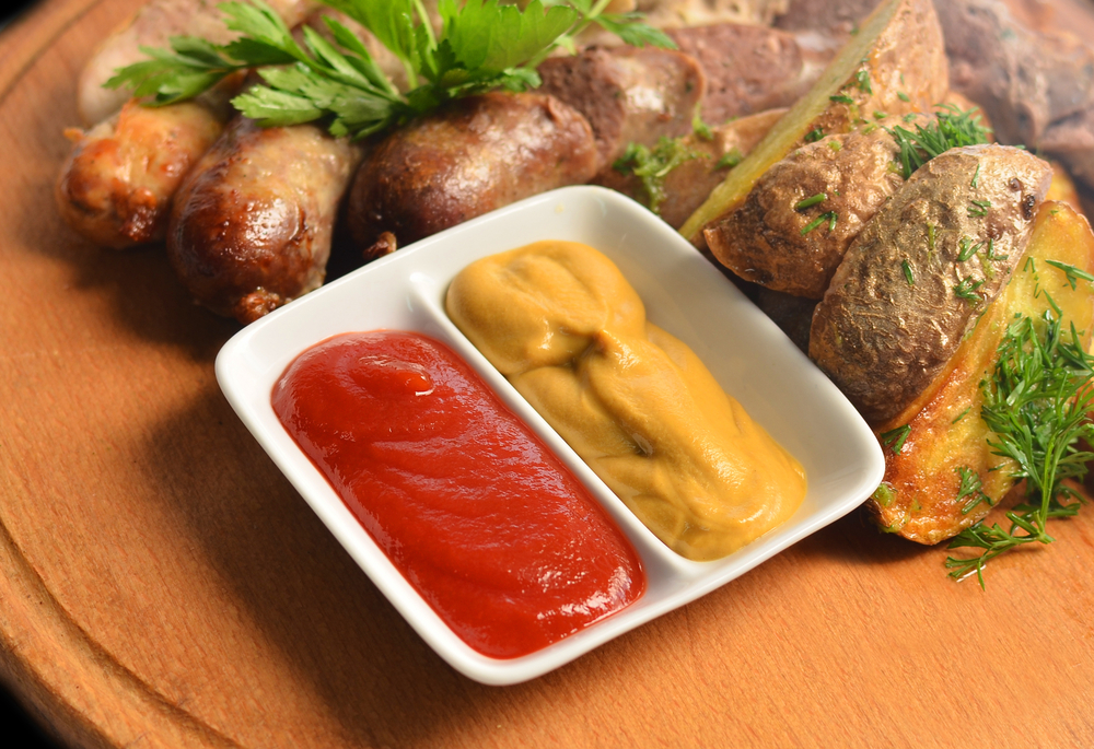 This invention was designed to make it quick and easy to get both ketchup and mustard on food with no fuss.