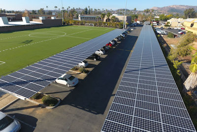 Baker used a solar carport configuration complementing the high school’s architecture.