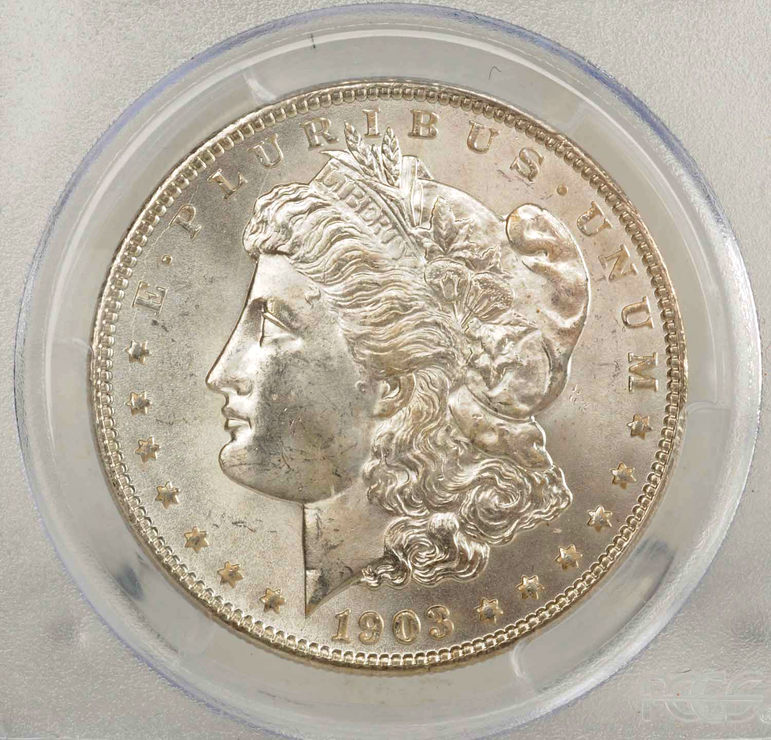 1903-O Morgan Silver Dollar, Estimated at $600-700.