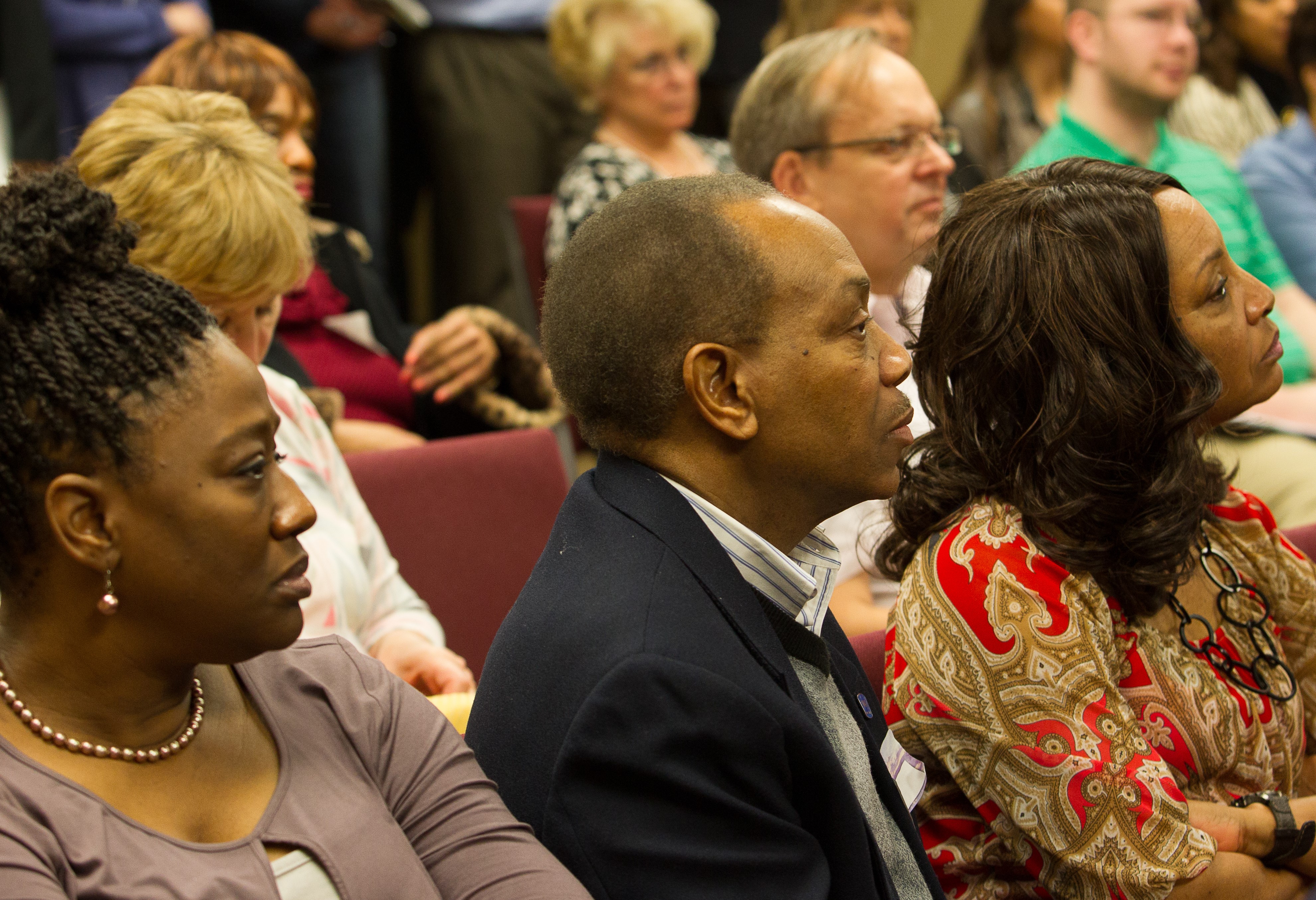 Audience members listen at a Marketplace Mobilization presentation. (Memories Matter Photo)