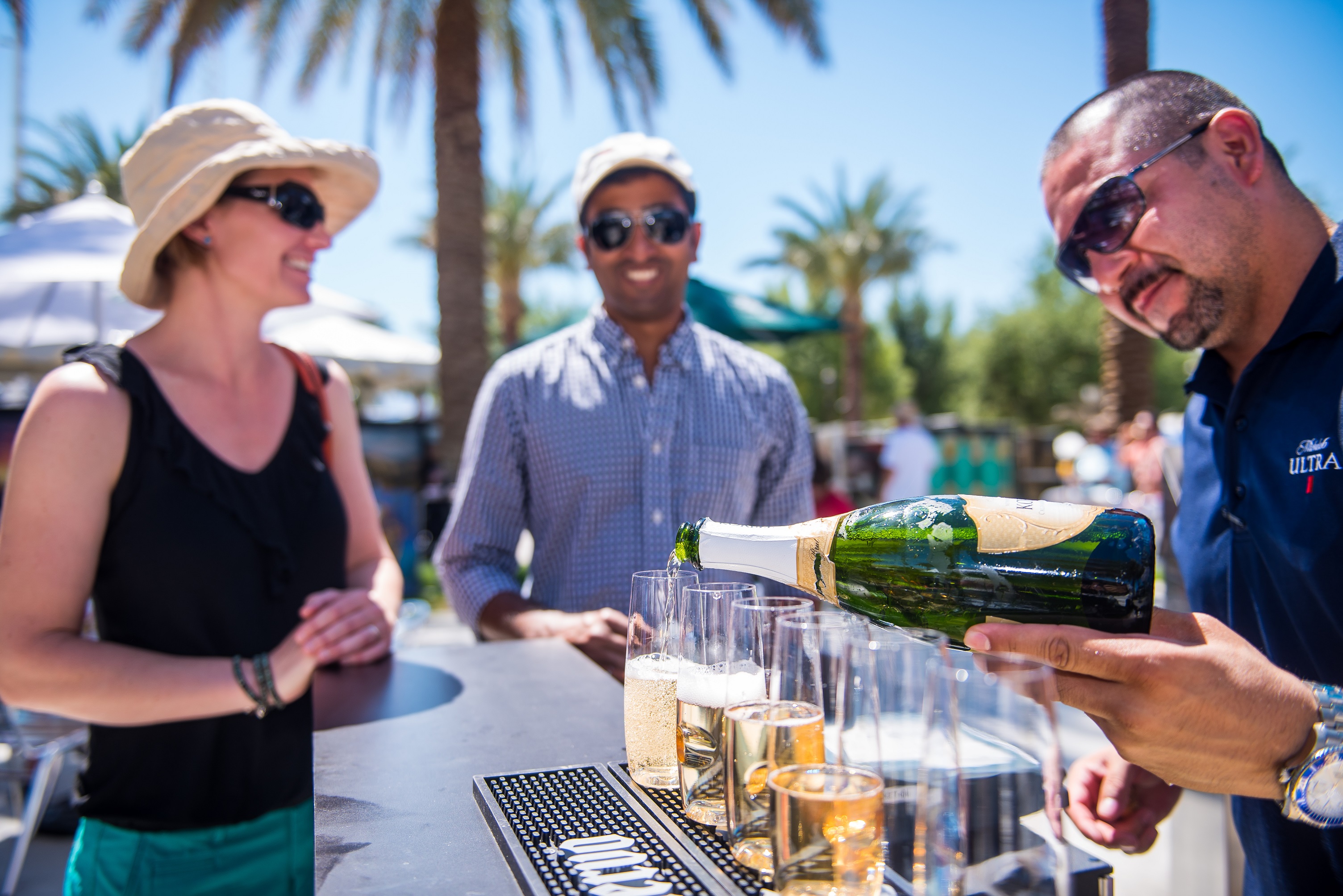 Festivalgoers enjoy the Champagne Circle Bar at the Indian Wells Arts Festival