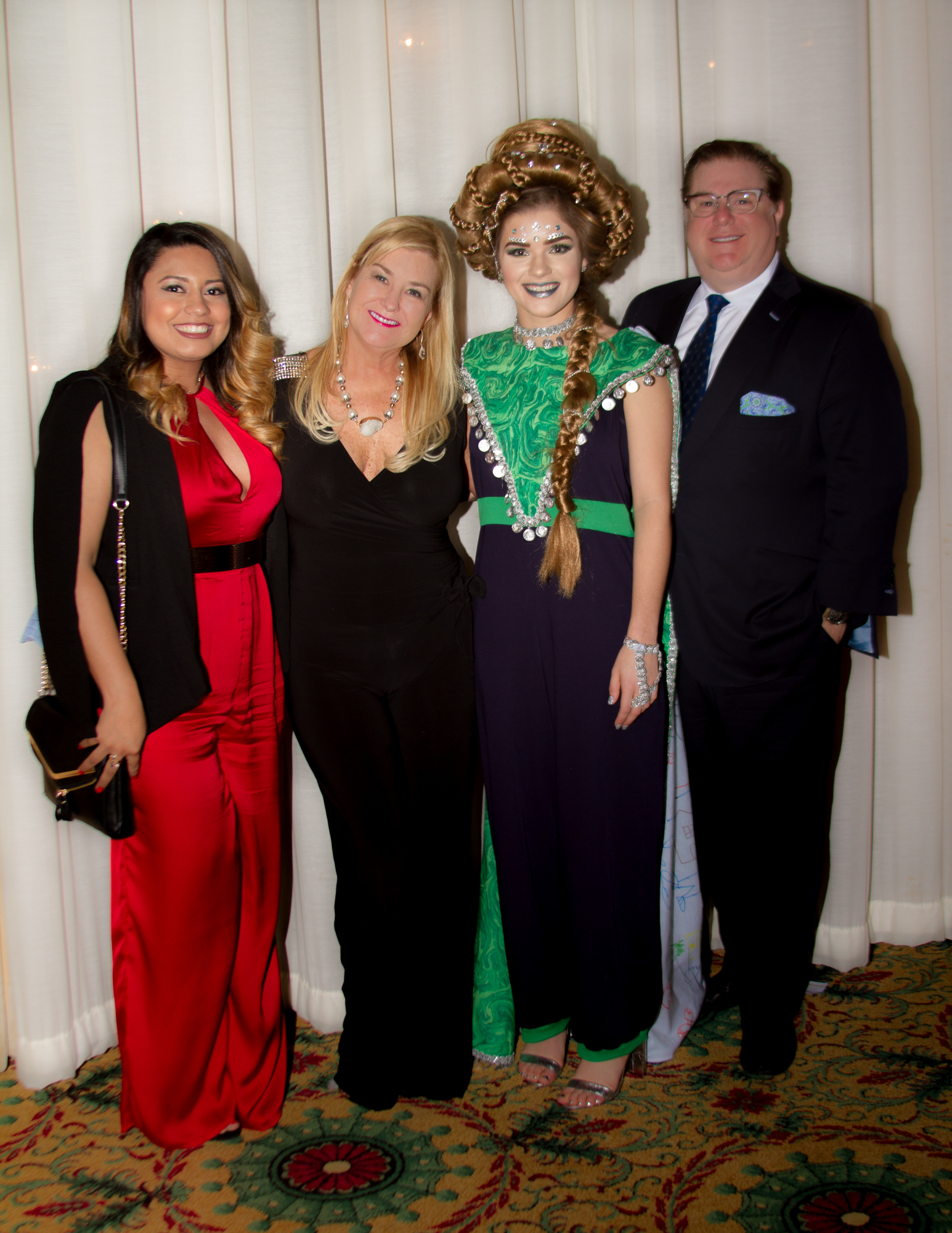 (from left to right) Executive Assistant to the AMG CEO Joselin Paz, AMG VP May Gayle Mengert, Model Virginia Billings and AMG CEO Paul Mengert.