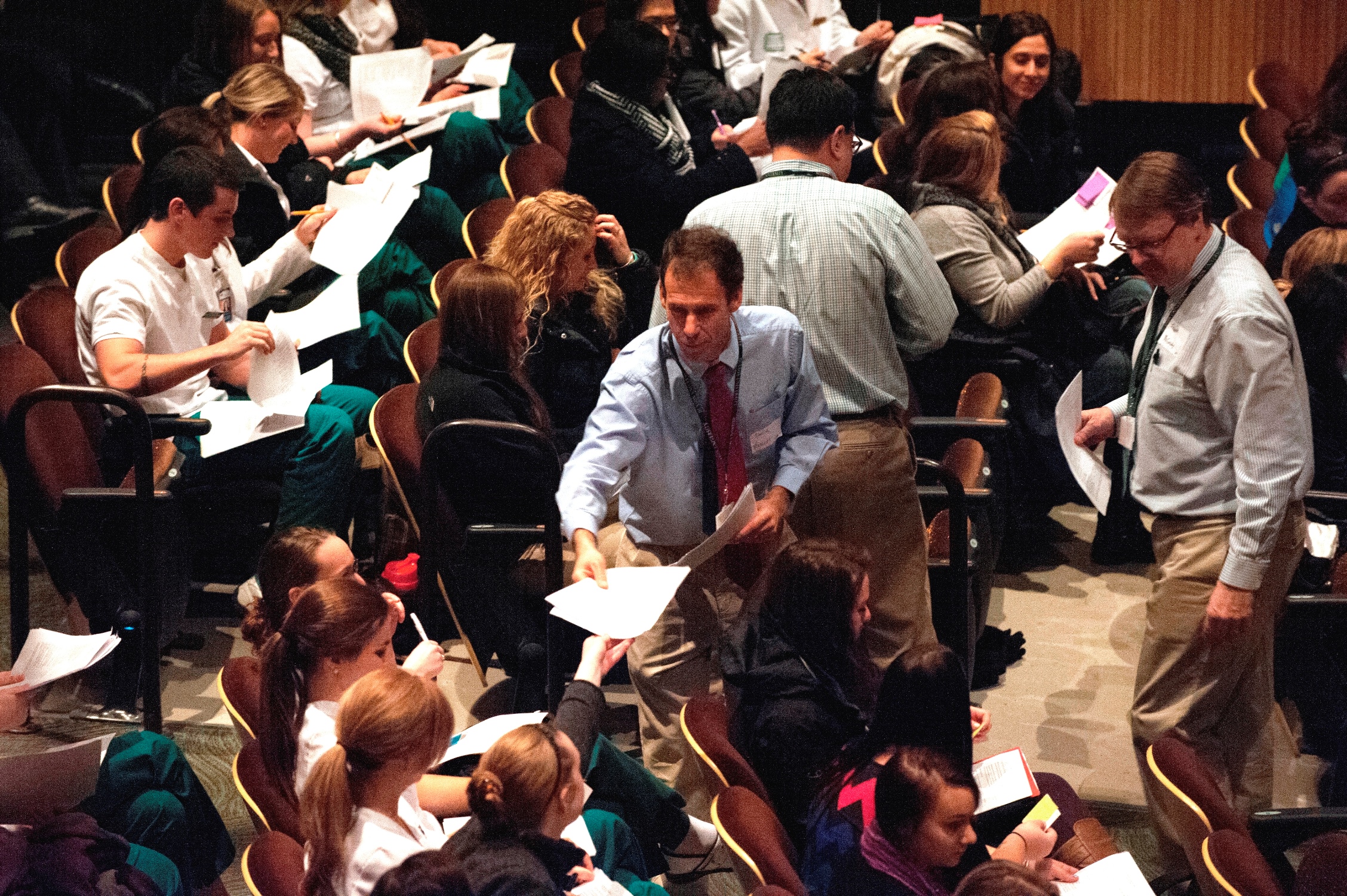 Twenty-five faculty facilitators help engage the more than 300 Husson students participating in the Interprofessional Evening of Conversation.