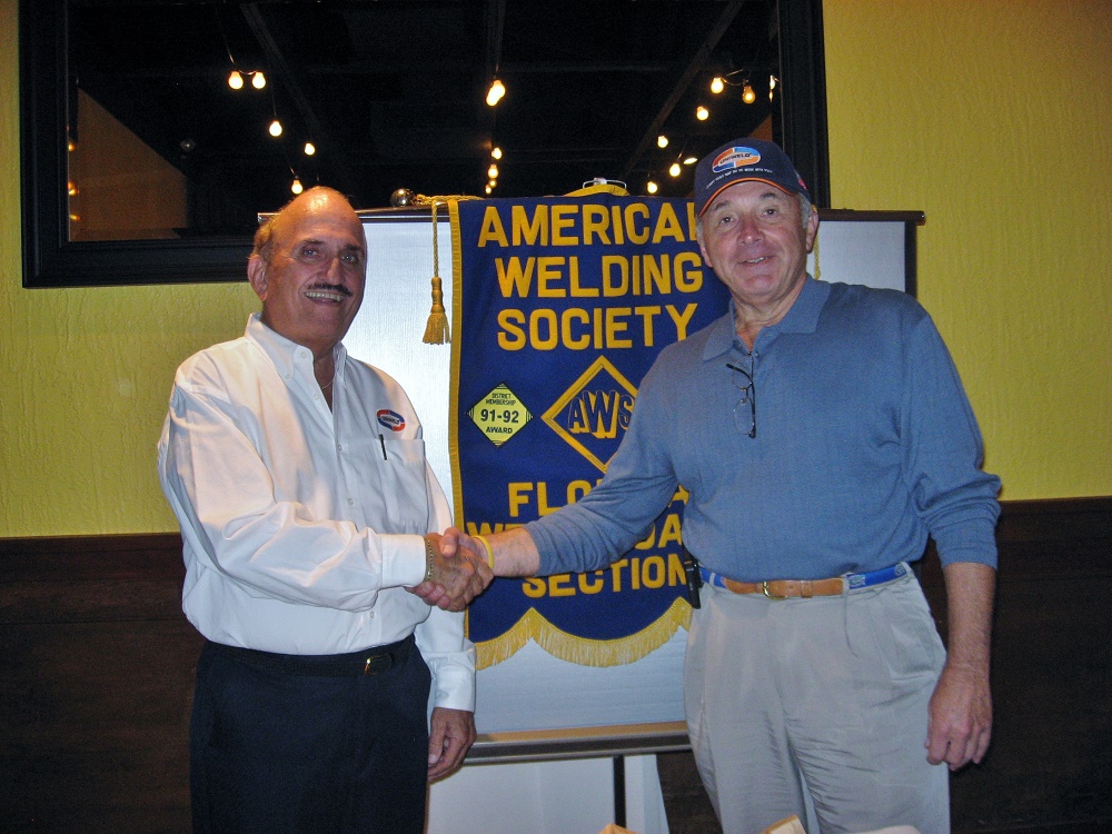 Uniweld Regional Sales Manager, Thomas McCormack with AWS West Florida Section Chairman, Al Sedory