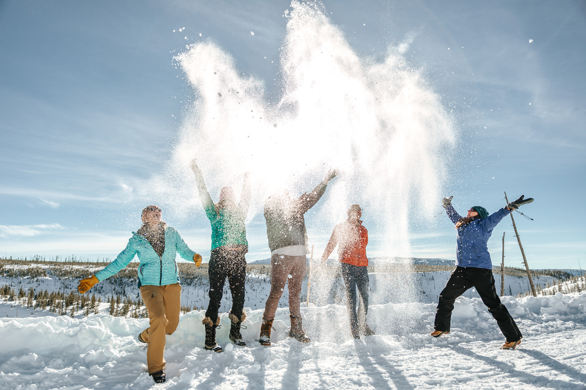 Wildlife Expeditions of Teton Science Schools guests enjoy stops for photo opportunities as guides share the scientific perspective on Yellowstone’s unique geothermal features (photo by Orijin Media).