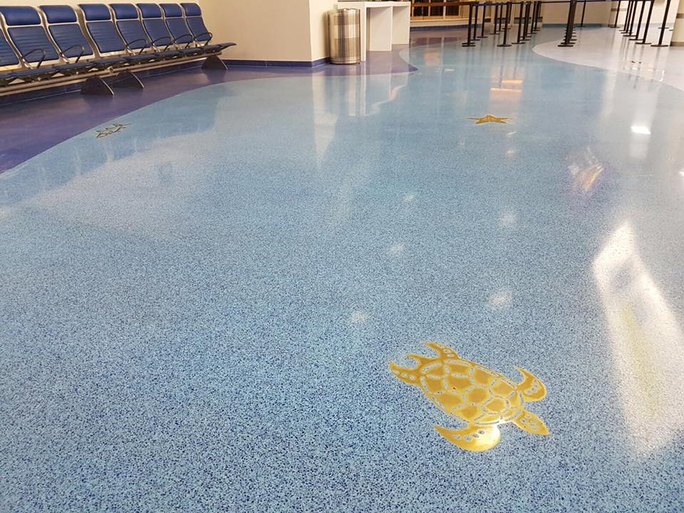 Follow the turtle: The Aruba Airport’s new epoxy terrazzo flooring with inlaid figurative medallions representing local fauna has a VB 225 moisture mitigation layer to keep everything dry and smooth.