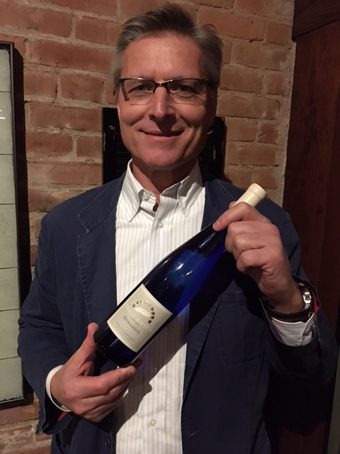 Cary L. Cox, owner of Tsali Notch Vineyard, holds Hiwassee, the most decorated Tennessee wine in the state's history.