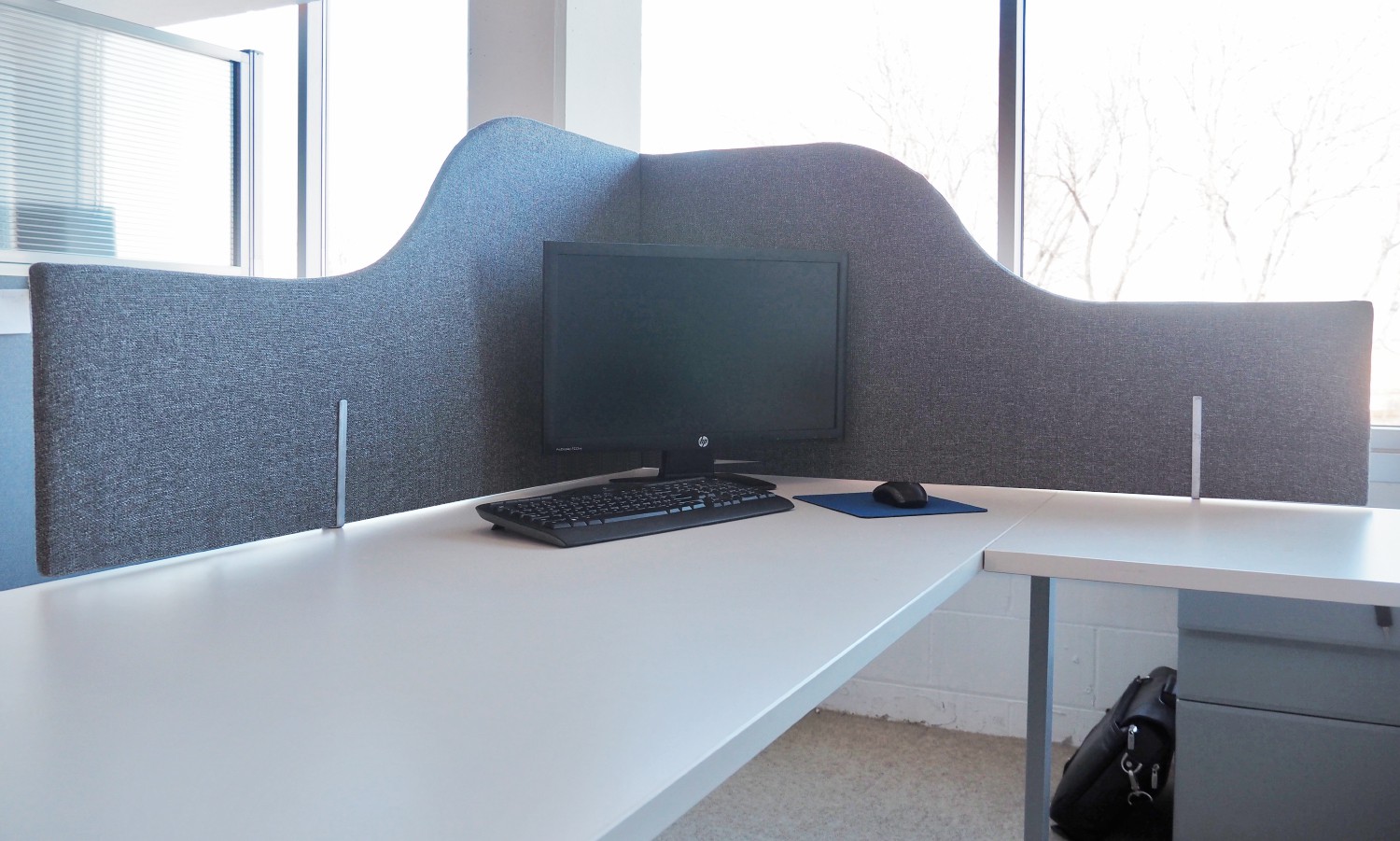 A private workstation enclosure is quickly created