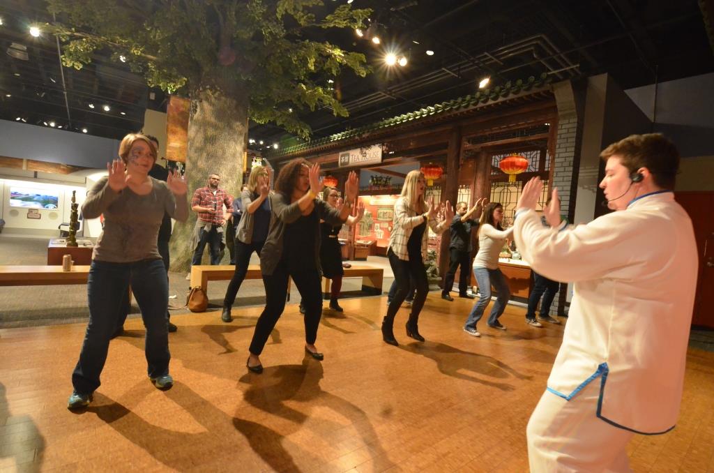 The over 21 crowd took time out from adult beverages, food, and playing for a Tai Chi lesson in Take Me There China