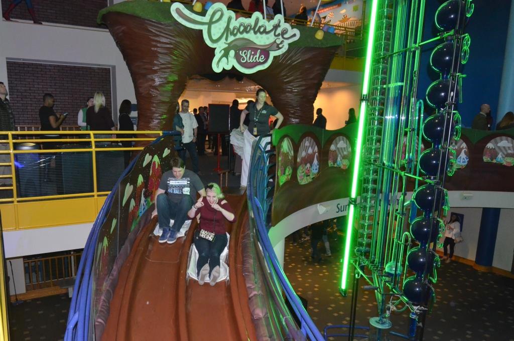 Zipping down the 47-foot-long Willy Wonka inspired chocolate slide