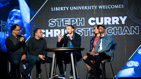 Steph Curry teamed up with Liberty alumnus Chris Strachan (right) to make the Kick'n It for Africa Humanitarian Partnership a huge success.