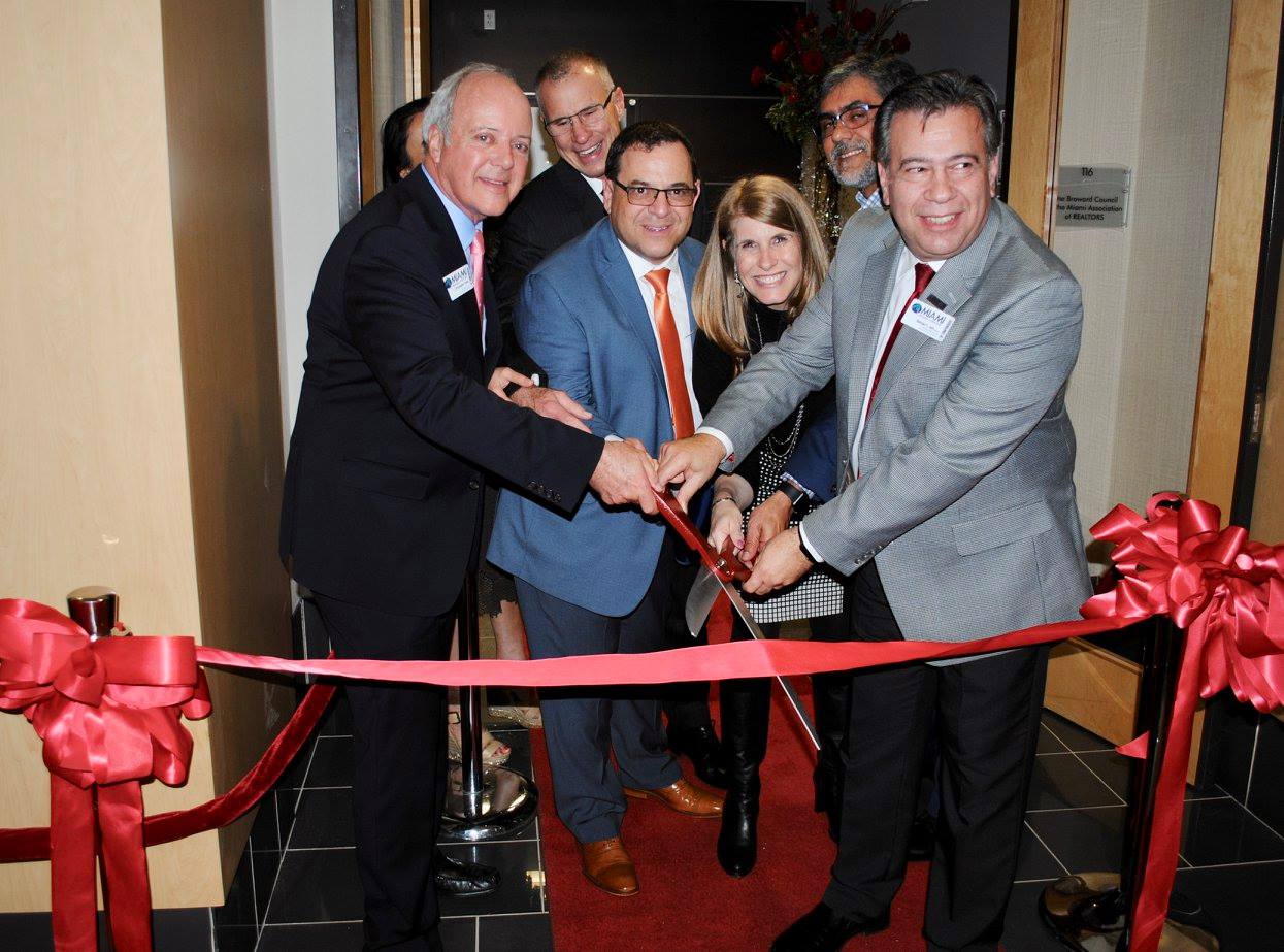 Cutting the Ribbon at the new Northeast Broward office