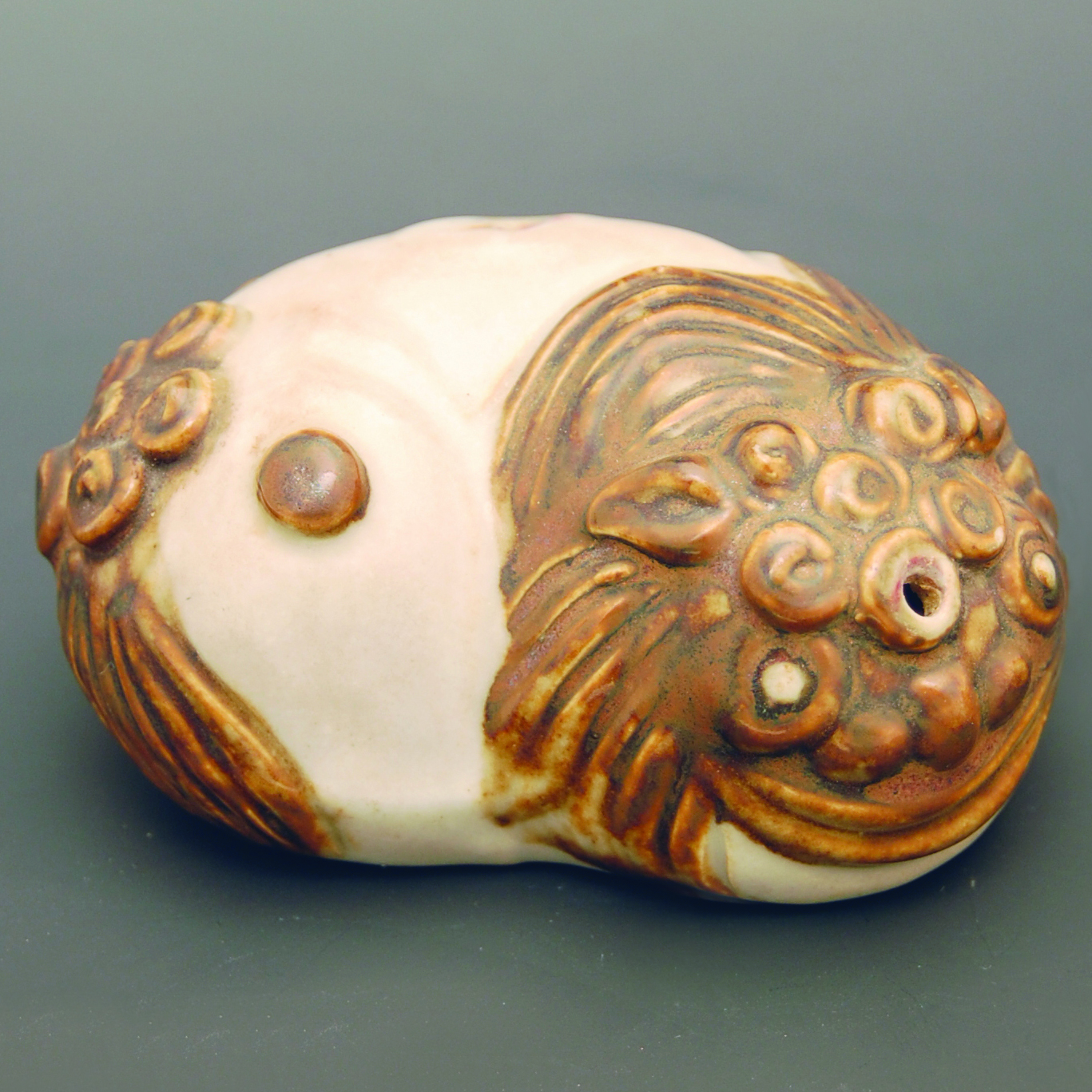 Korean ceramic water dropper in shape of lion. Josean Dynasty, at Gianguan Auctions.