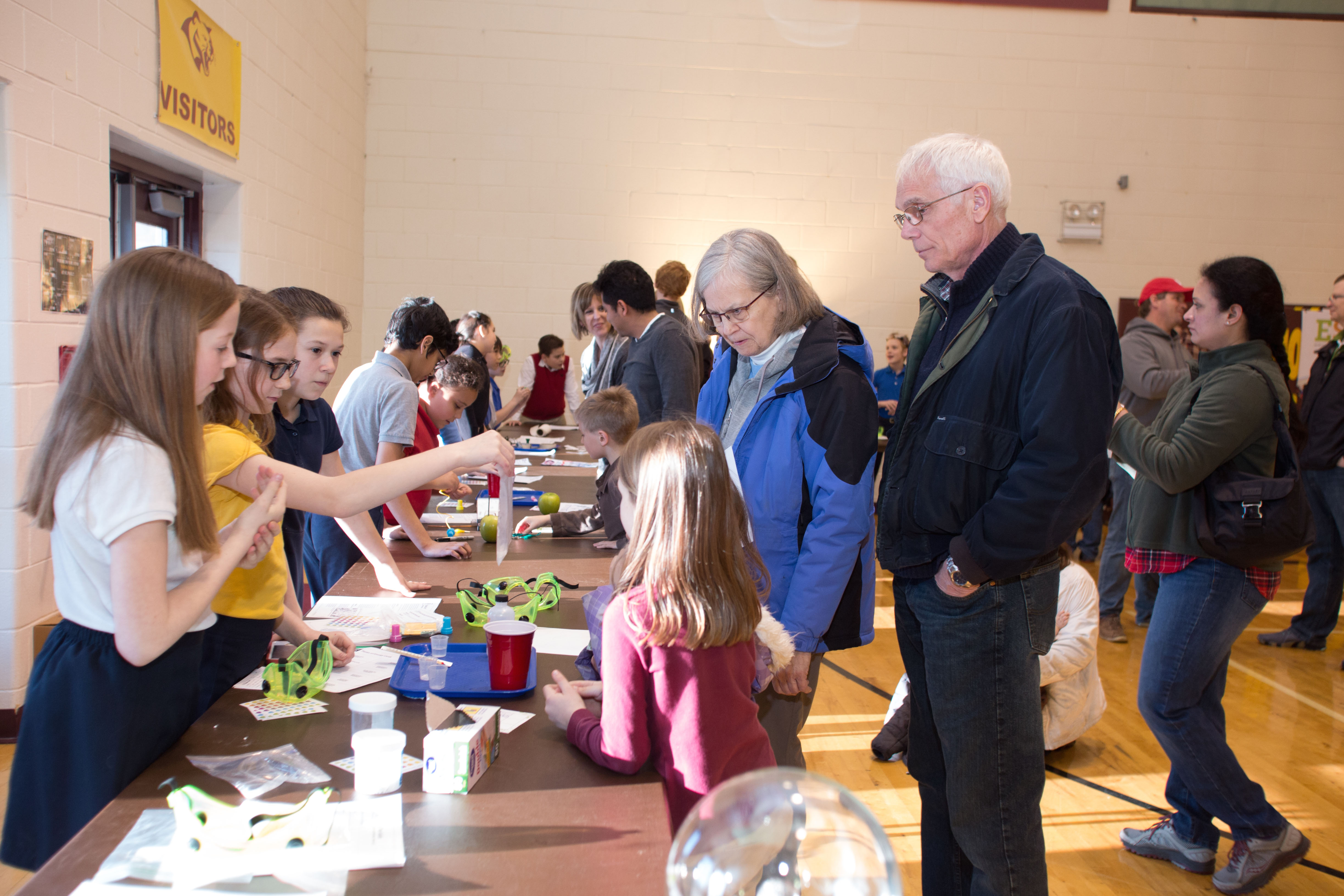 Visitors observe one of the many science projects the school’s fourth through eighth grade students presented at the recent St. Paul Lutheran STEM Night.