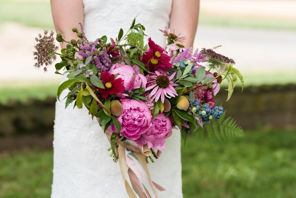 Nothing says local like fresh-from-the-farm herbs, vegetables and fruits integrated in a garden-inspired wedding bouquet. This aesthetic is just right for a foodie couple and their farm-to-table recep