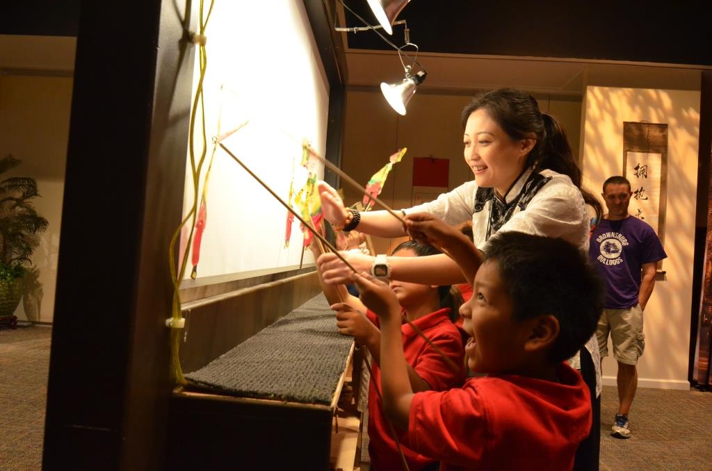 Be part of a Chinese shadow puppet play