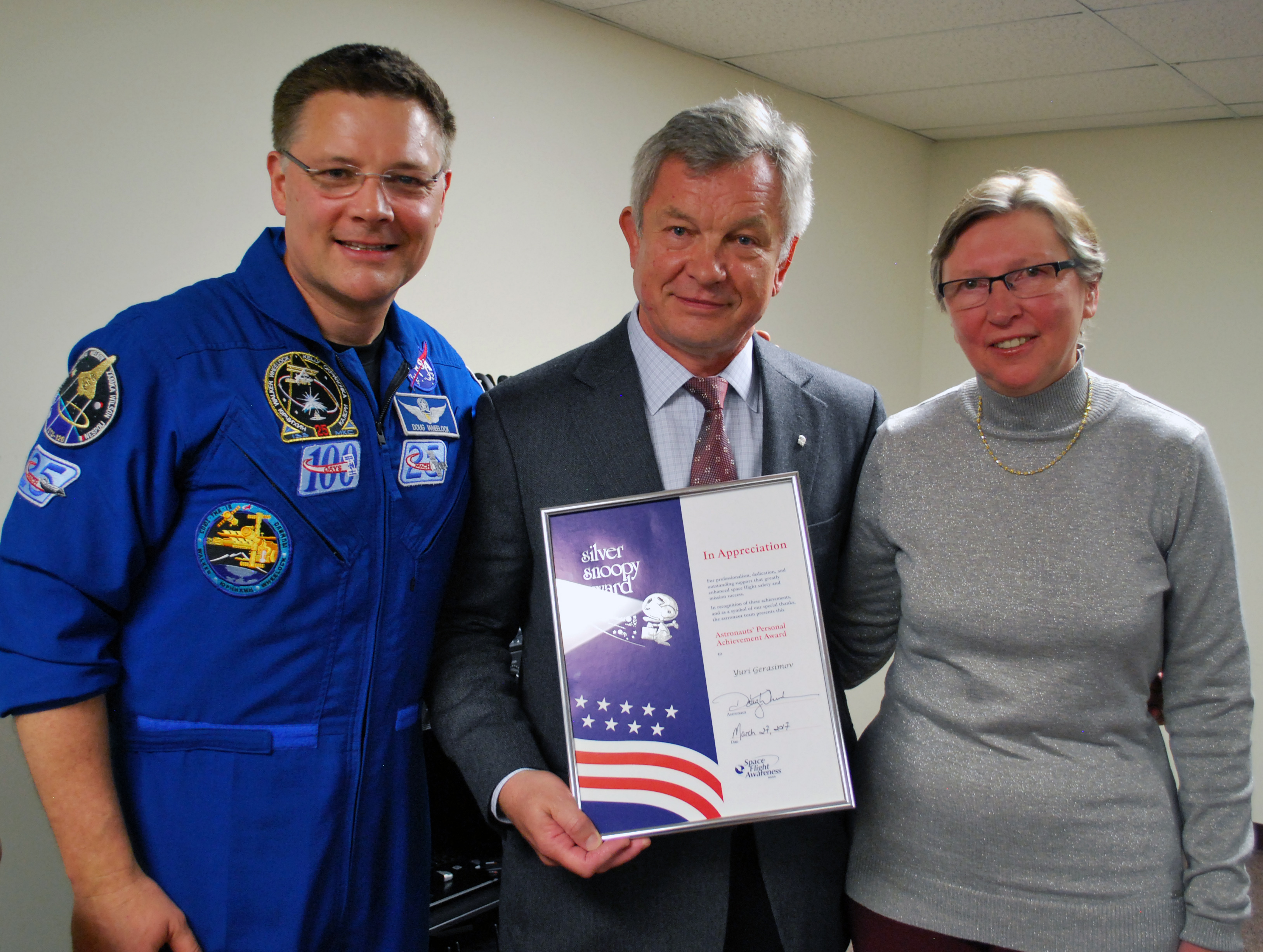 Pictured: Yuri Gerasimov and his wife Nina, along with NASA Astronaut Colonel Douglas Wheelock