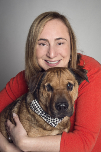 Camp Canine owner Tania Isenstein with her rescue dog, Nacho