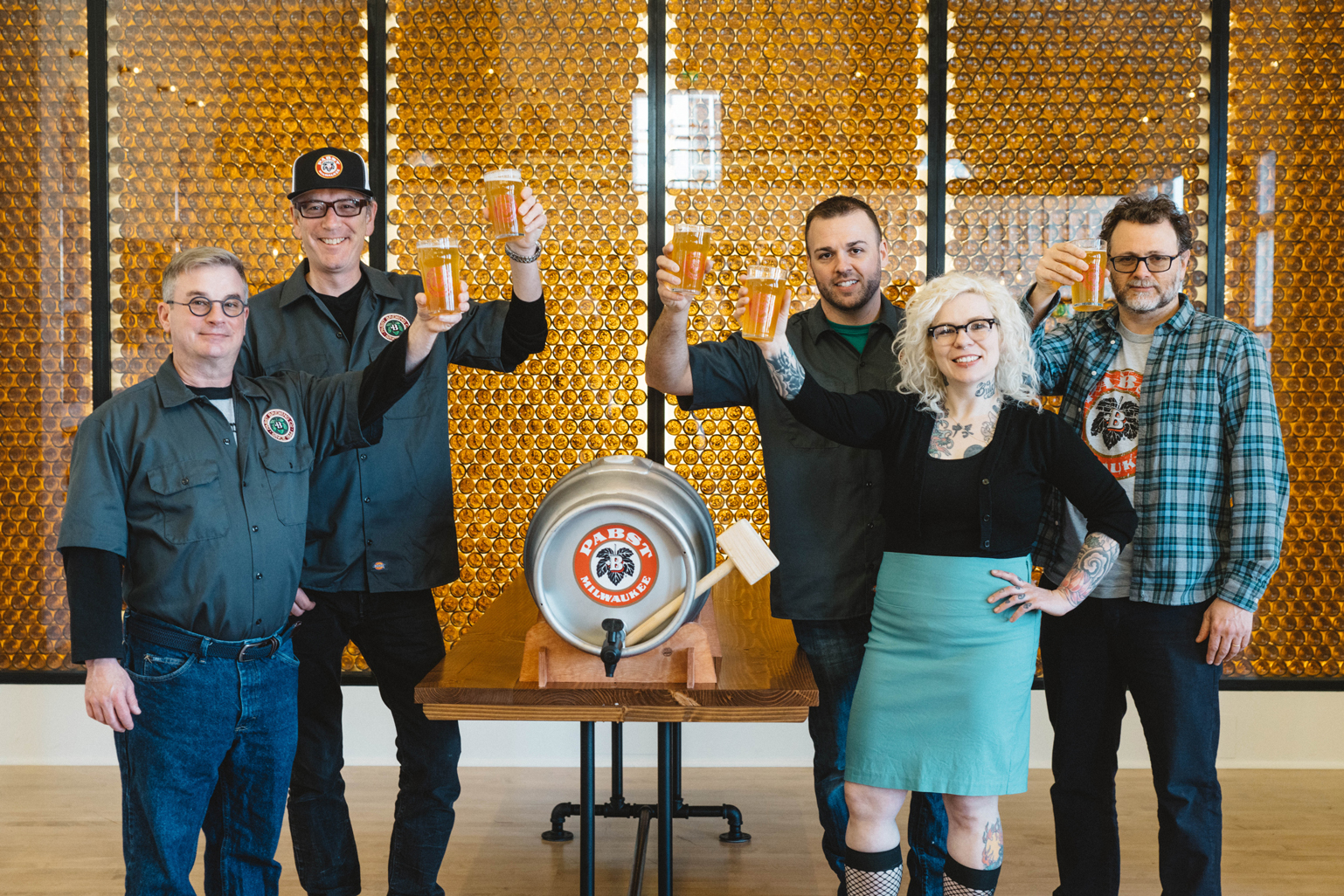 From left, Pabst Brewing Co. Master Brewer Greg Deuhs, CEO Simon Thorpe, Head Brewer John Kimes, Experience Manager Rebecca Berkshire, and Chairman Eugene Kashper toast after a ceremonial firkin keg t