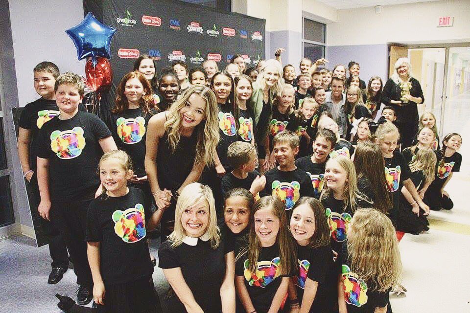 Radio Disney Country artist Temecula Road and correspondent Savannah Keyes with students and teacher Angela Mangum at Tar River Elementary in Franklinton, NC.