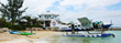 Tropic Ocean Airways’ Cessna Grand Caravan seaplane parked on the beach at STAR Island