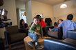 Jordan McCrackin, 3, plays in the living room of the family's new apartment