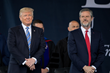 U.S. President Donald Trump stands with Liberty University President Jerry Falwell at Liberty's 44th Commencement.