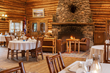 Delicious gourmet meals are part of the all-inclusive Brooks Lake Lodge & Spa experience and are served in the historic dining hall, which also boasts a Western art collection and stone fireplace.