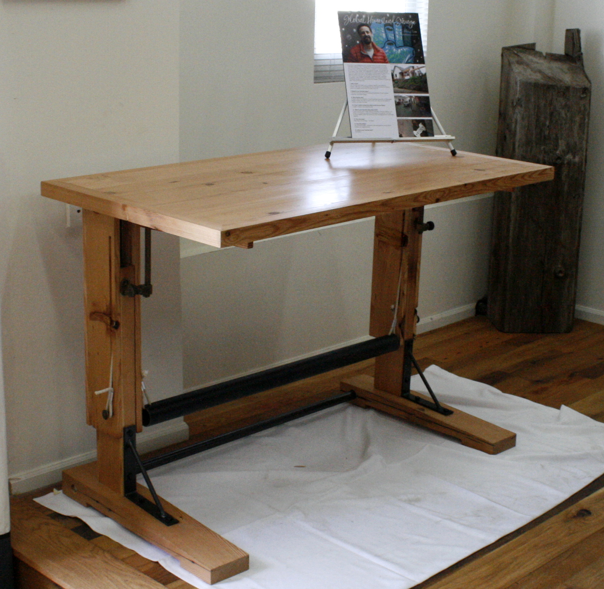 Antique Heart Pine was giving new life as a sash table created by Global Homestead Garage for Pioneer Millworks.