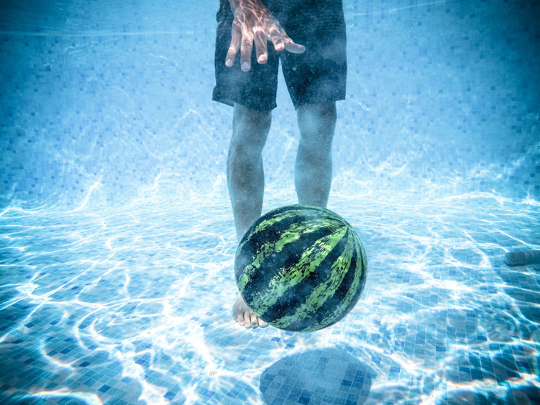 Dribble Watermelon Ball under water