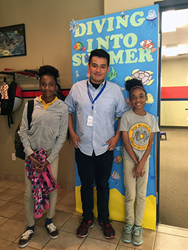 Clubhouse Director Roger Martinez (C) with contest winner Monica (R) and sister (L) at Montandon Boys & Girls Club